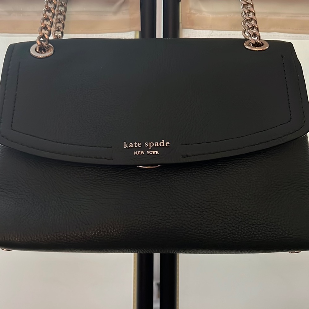 Kate Spade dark green leather purse. Can be shoulder length or short.